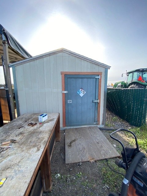 Carol Munch showing off the inside of the new shed