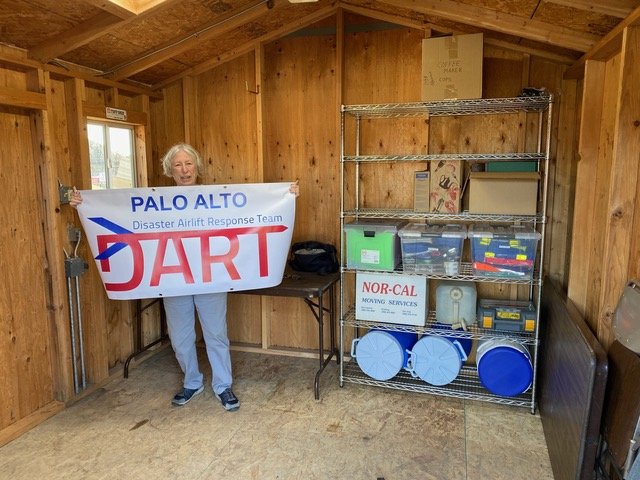 Carol Munch showing off the inside of the new shed